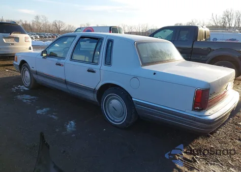 1990 Lincoln Town Car Signature из США, поврежденный, VIN 1LNLM82F5LY607417